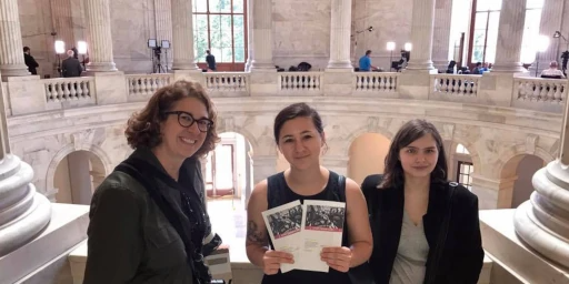 Herd on the Hill volunteers in the Russell Senate Office Building atrium balcony